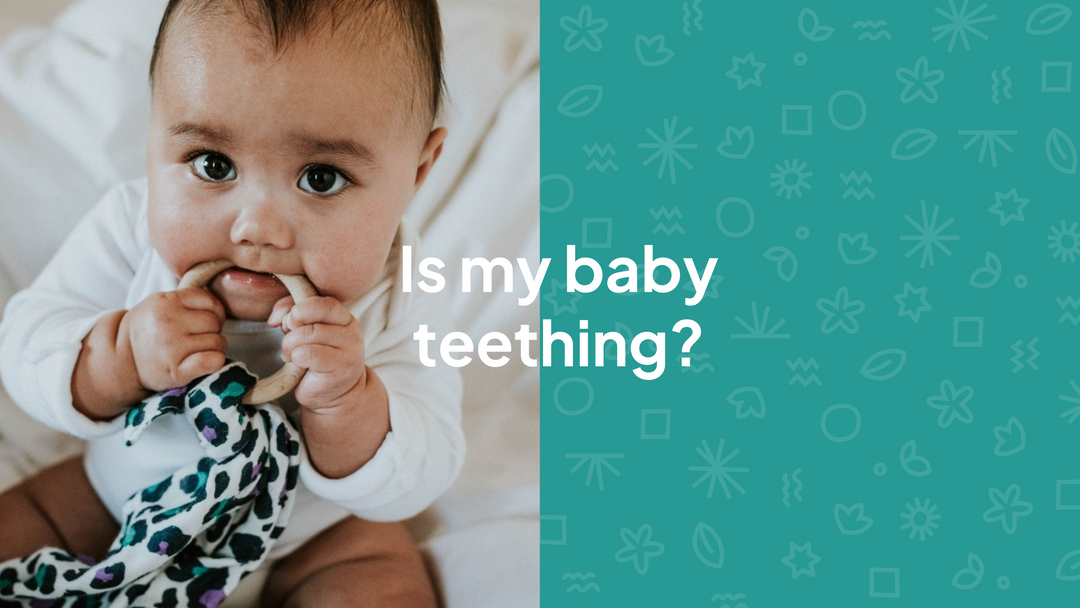 is my baby teething. baby with fingers in mouth