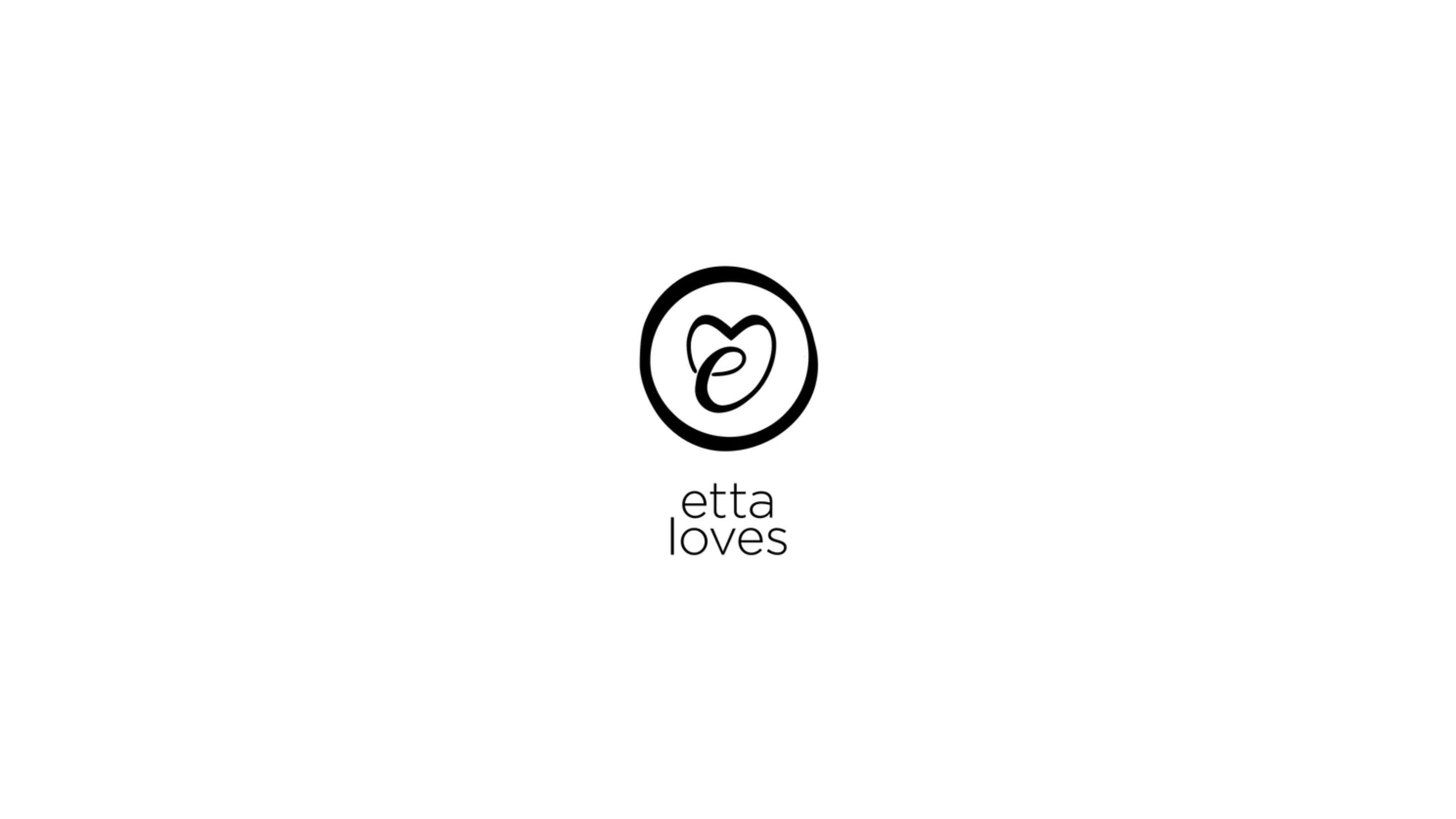 Etta Loves logo - black heart and the letter E intertwined in a circle