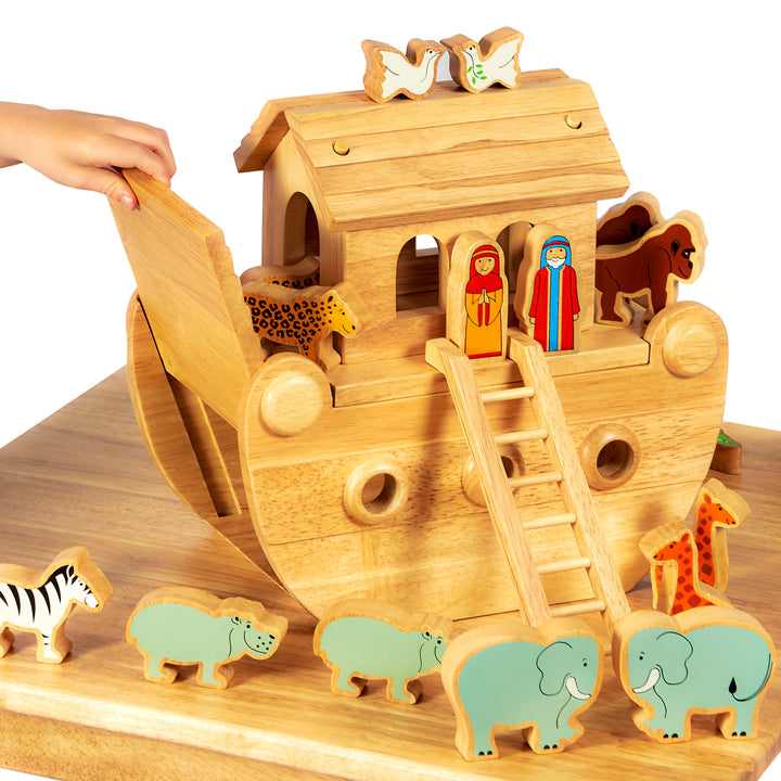 Wooden toy Noah's Ark with animals and figures on a wooden base