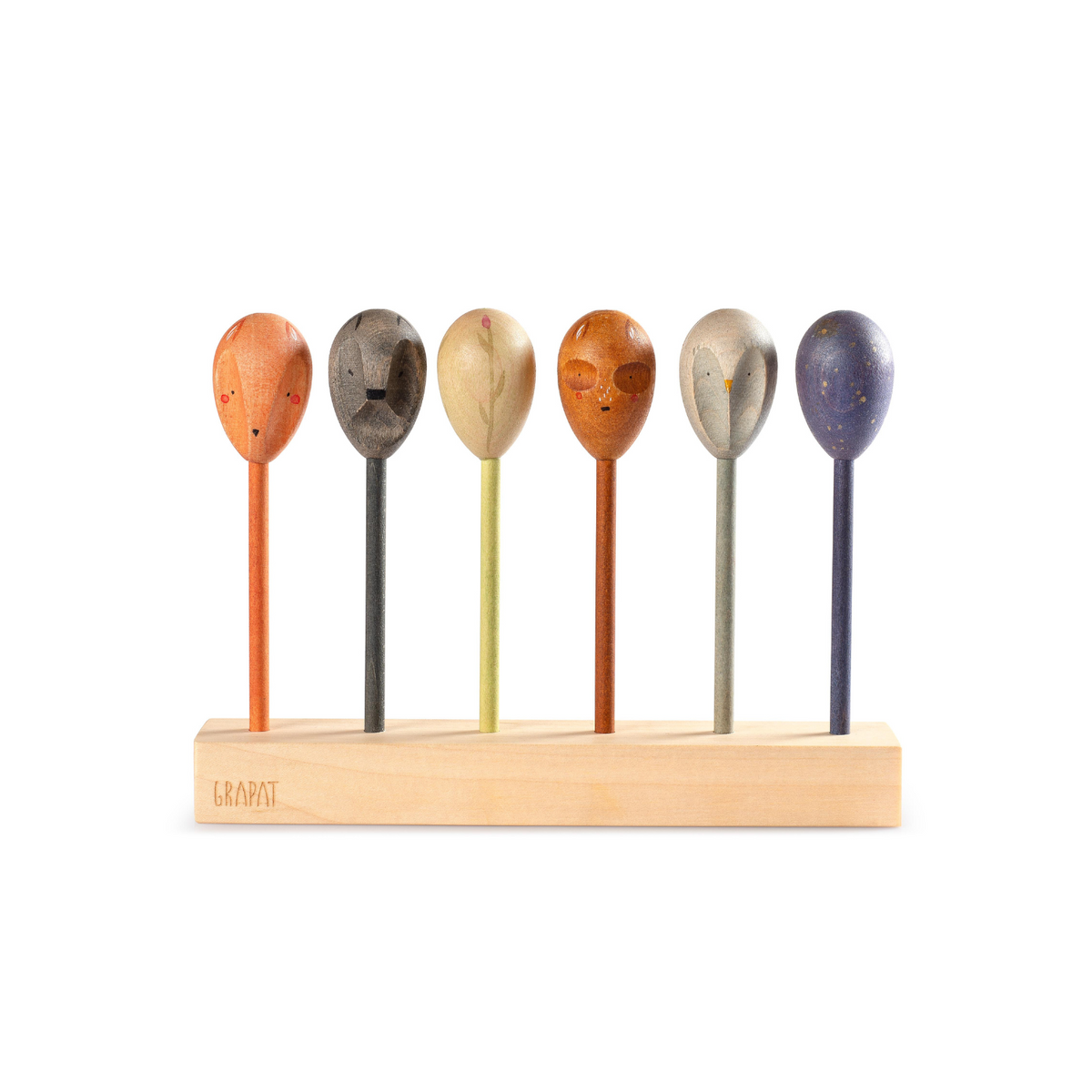 six wooden puppets in earth tones with double sided faces. The puppets are in a line on a wooden stand. The puppets are for storytelling and suitable for age 3 and over. 