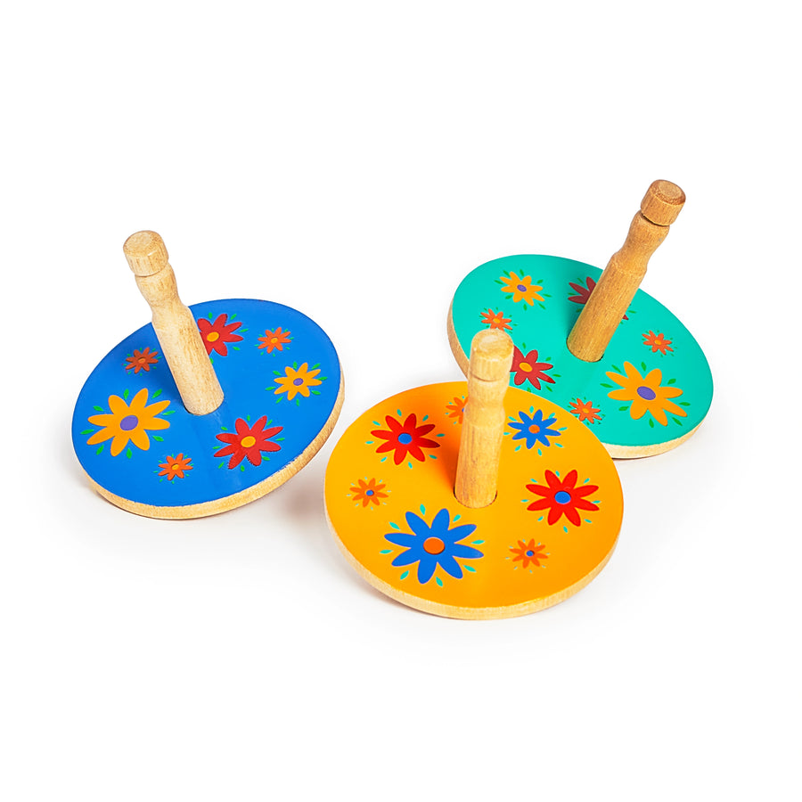 Lanka Kade 30th Birthday Edition Wooden Spinning Top in yellow, blue and green with colourful painted flowers. For children over 3 years. 