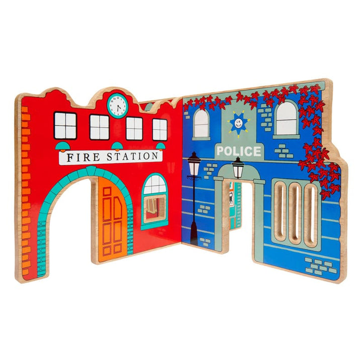 wooden play scene with police and fire station. age 3+