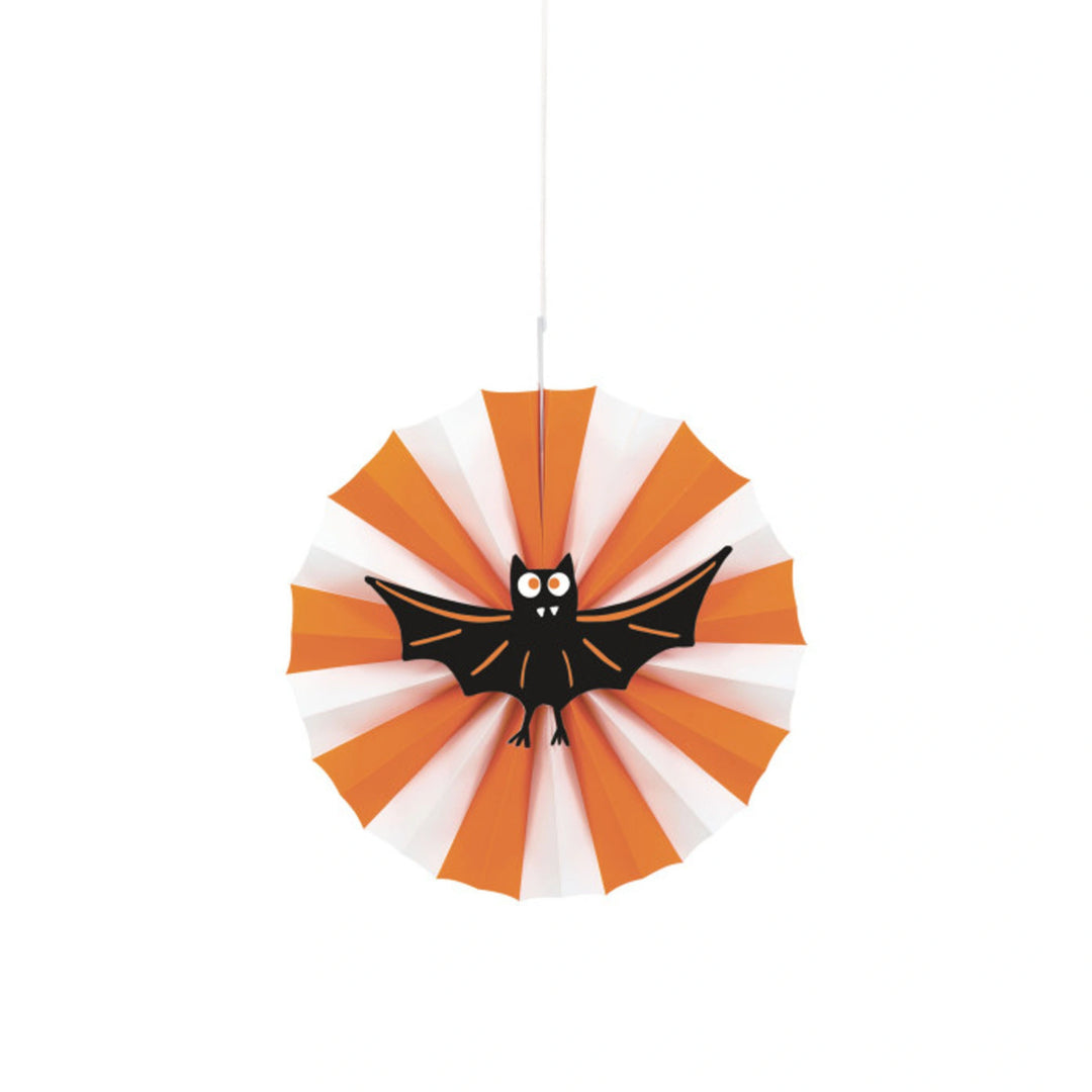 orange and white striped round fan shaped hanging decoration with a cute black bat in the centre.