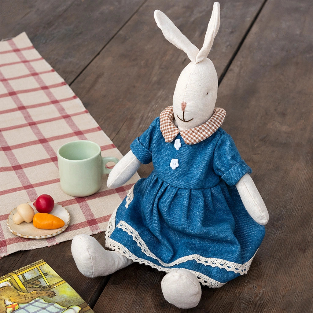 bella the bunny rabbit soft toy by rex london. A white 40cm rabbit toy wearing a blue dress. For children aged 1+