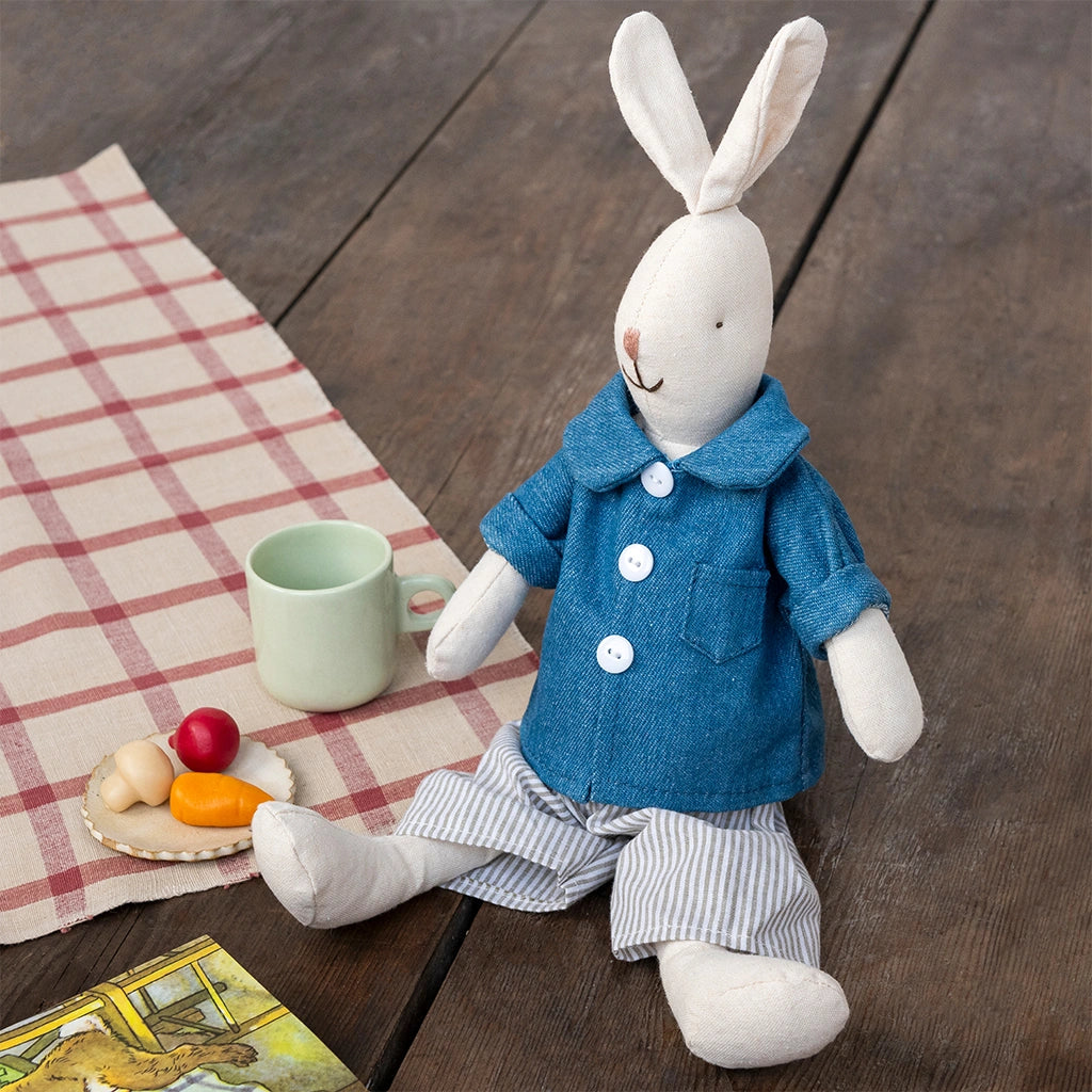 Bertie the Bunny soft toy in a child's bedroom with play food and a picnic blanket- perfect for imaginative play