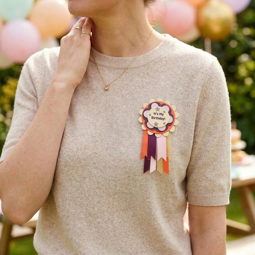woman wearing a birthday rosette badge