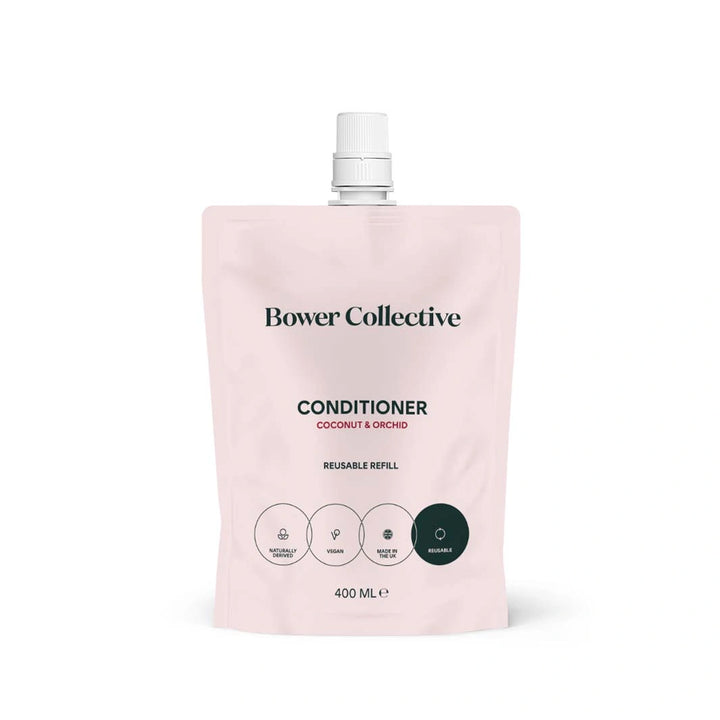 pink refill pouch with bower collective coconut and orchid conditioner for all hair types