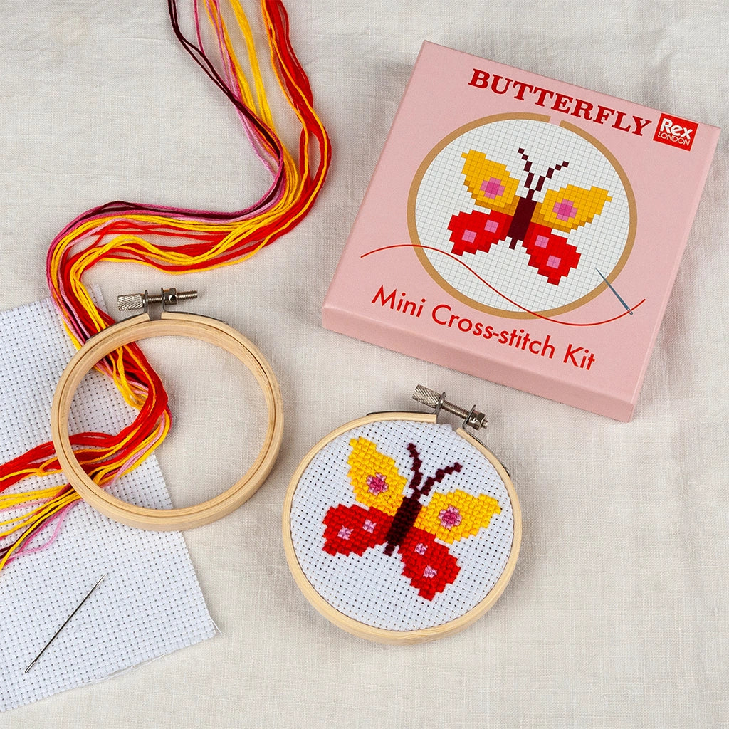 Child stitching a Butterfly Cross-Stitch Kit | Creative craft activity for kids, developing fine motor skills