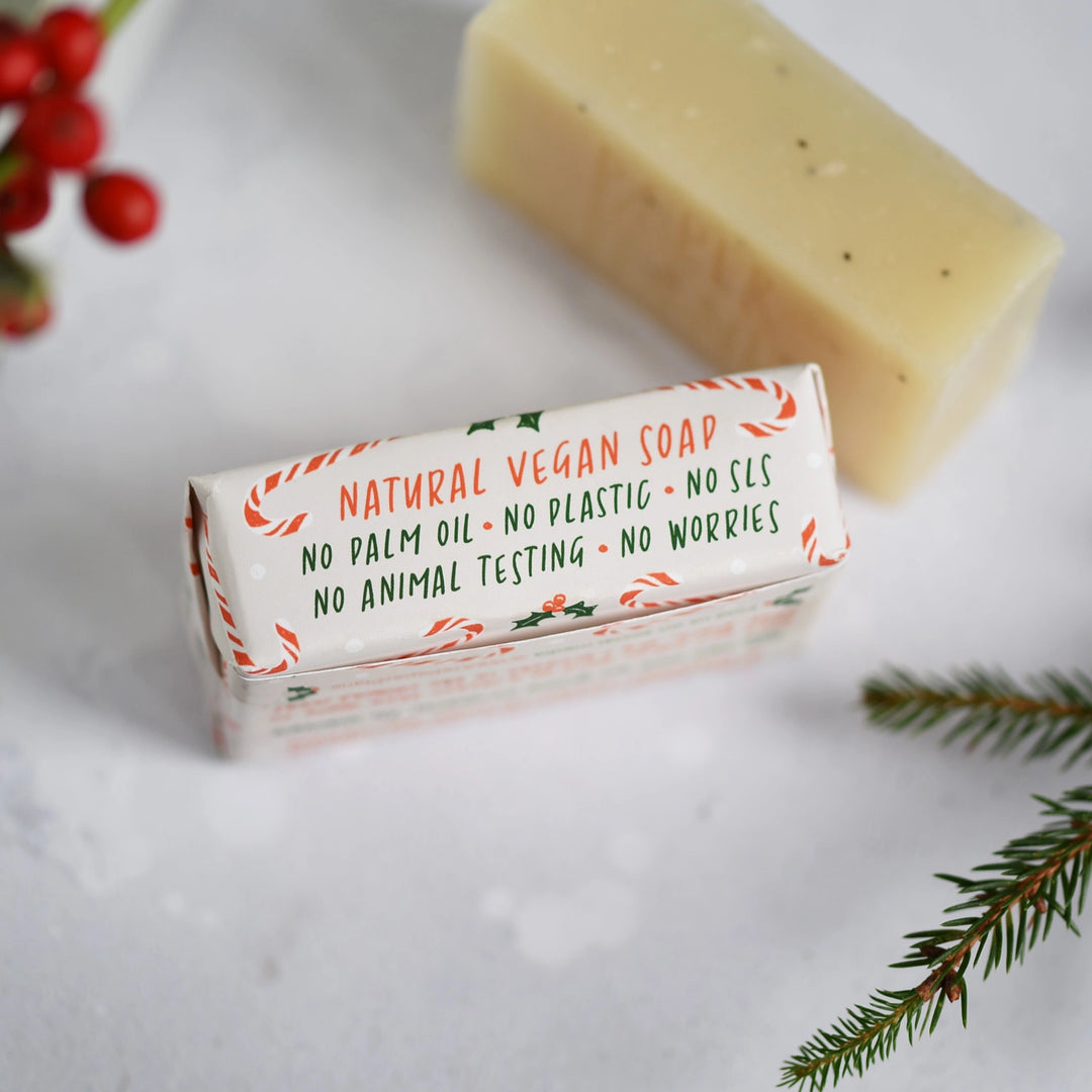 Bar of natural vegan soap with a label on a white background
