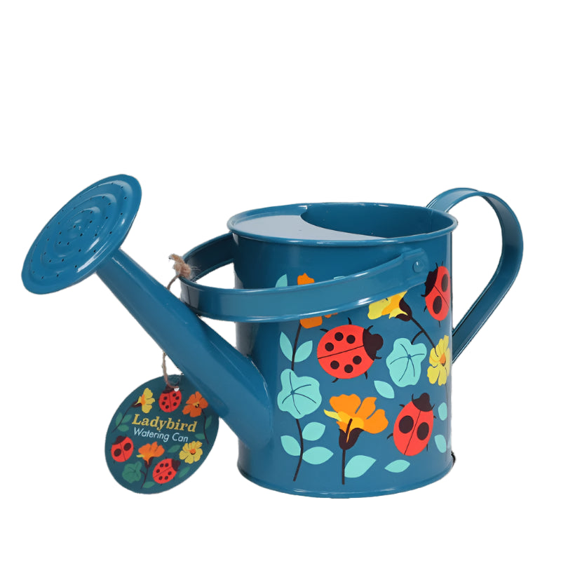 childrens metal watering can with flower and ladybird print. For age 3+
