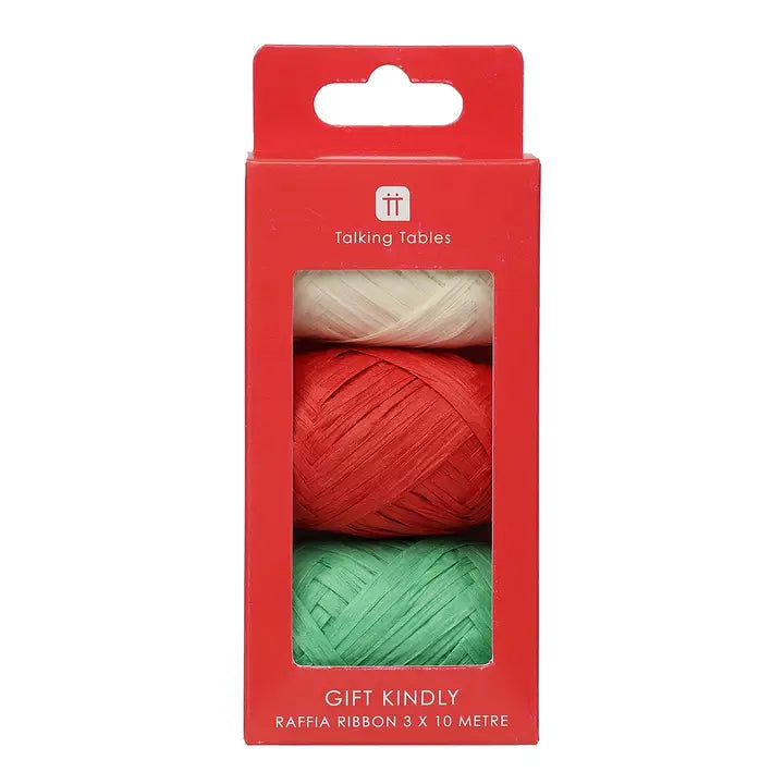 Red box with raffia ribbon balls inside, featuring the 'Talking Tables' brand.