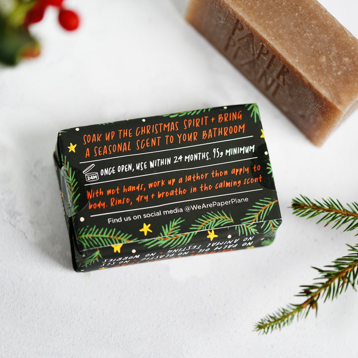 Bar of soap with a decorative label on a white background