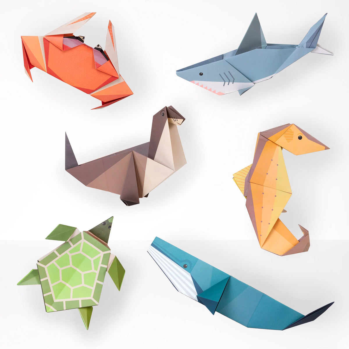 finished marine creatures from the Clockwork Soldier Create Your Own Giant Ocean Origami Craft Kit, on a white background