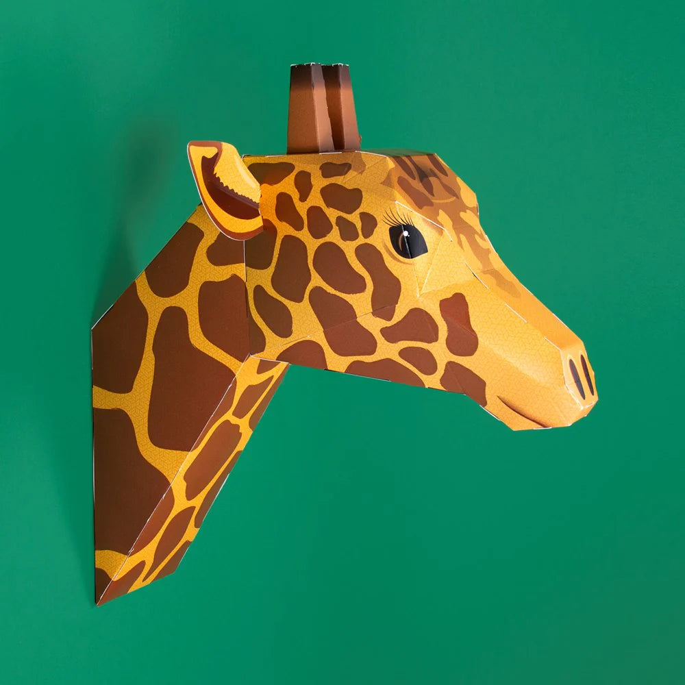 Create Your Own Gentle Giraffe Craft Kit, finished giraffe head on a green wall