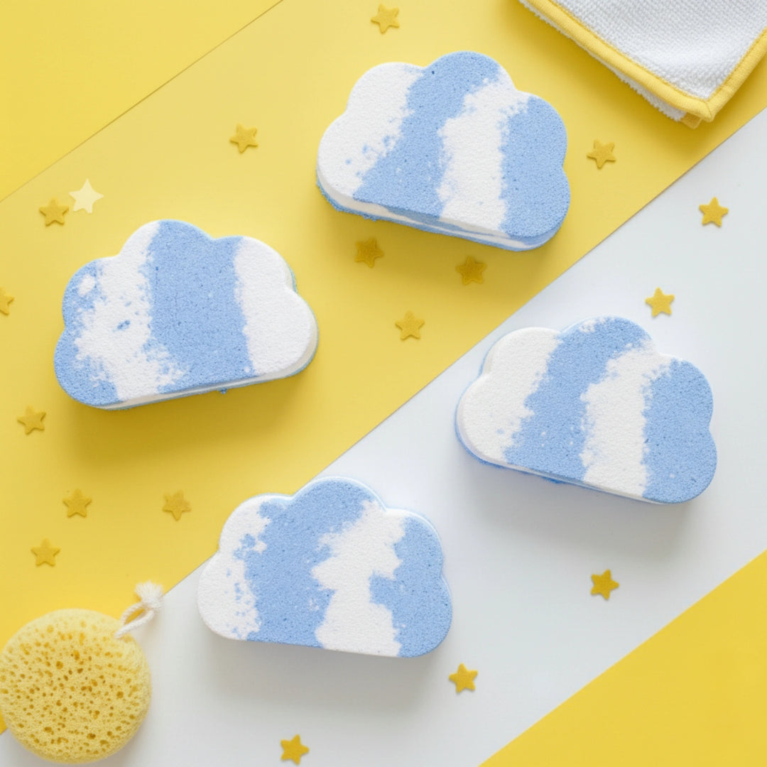 Cloud-shaped bath bombs on a yellow and white background with star decorations