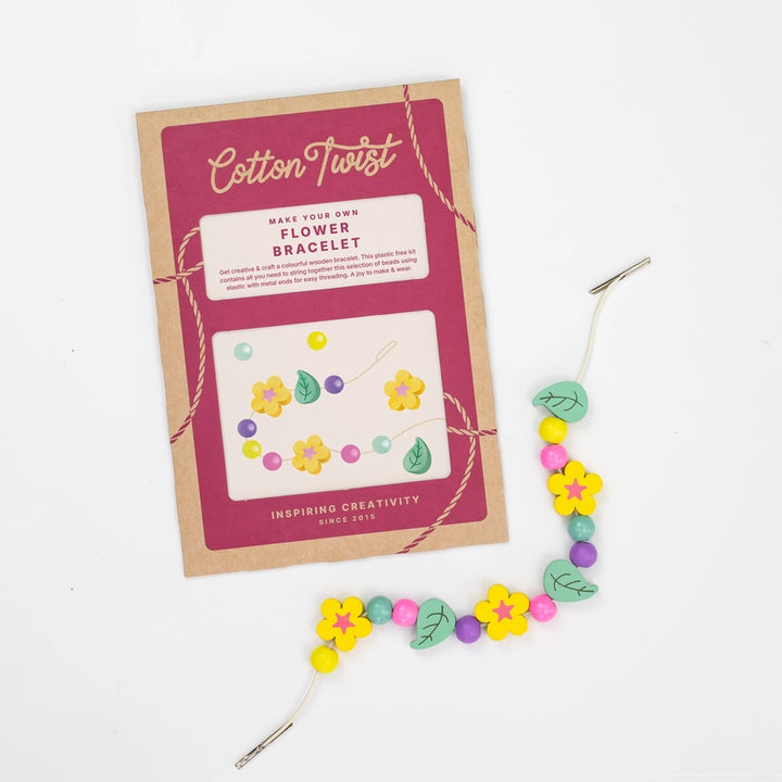 Cotton Twist craft kit for making a flower bracelet on a white background