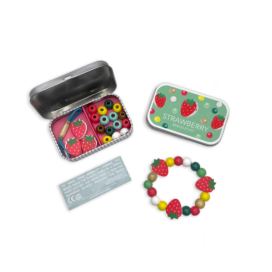 Strawberry Bracelet Kit: Open tin with beads, closed tin, finished bracelet, and instructions.