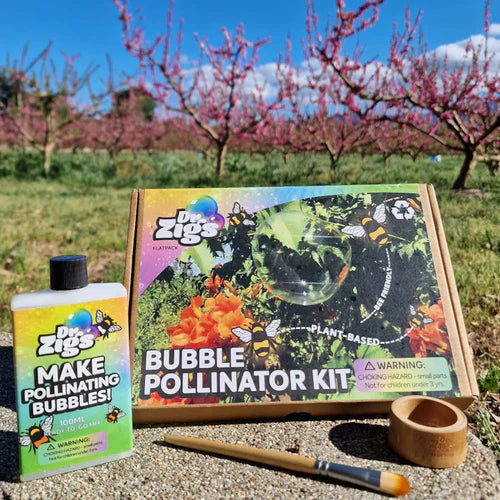 Dr Zigs Bubble Pollinator Kit on a stone with a countryside backdrop