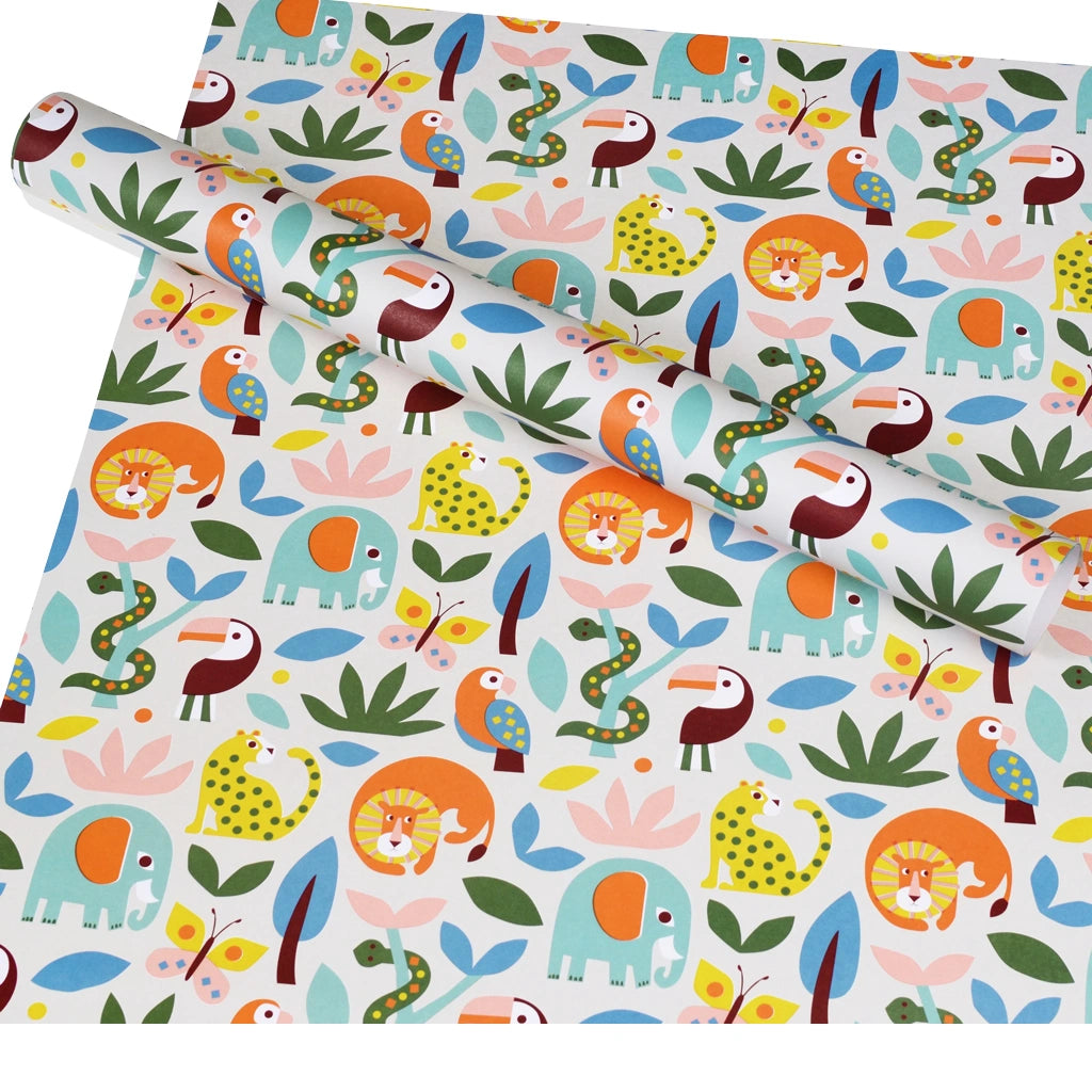 colourful animal print wrapping paper with lions, elephants and leopards on a white background.