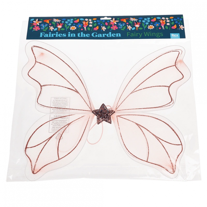 pale pink Fairy Wings Dress Up accessory with two butterfly wings and a glitter star. The wings are in Fairies in the Garden floral packaging. For children aged 3 and over.