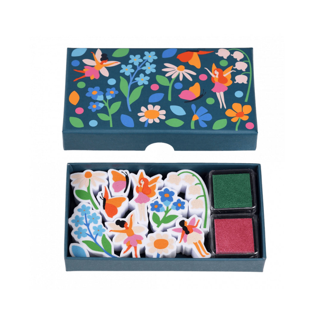 Colourful fairy stamp set with floral and fairy designs in a box on a white background