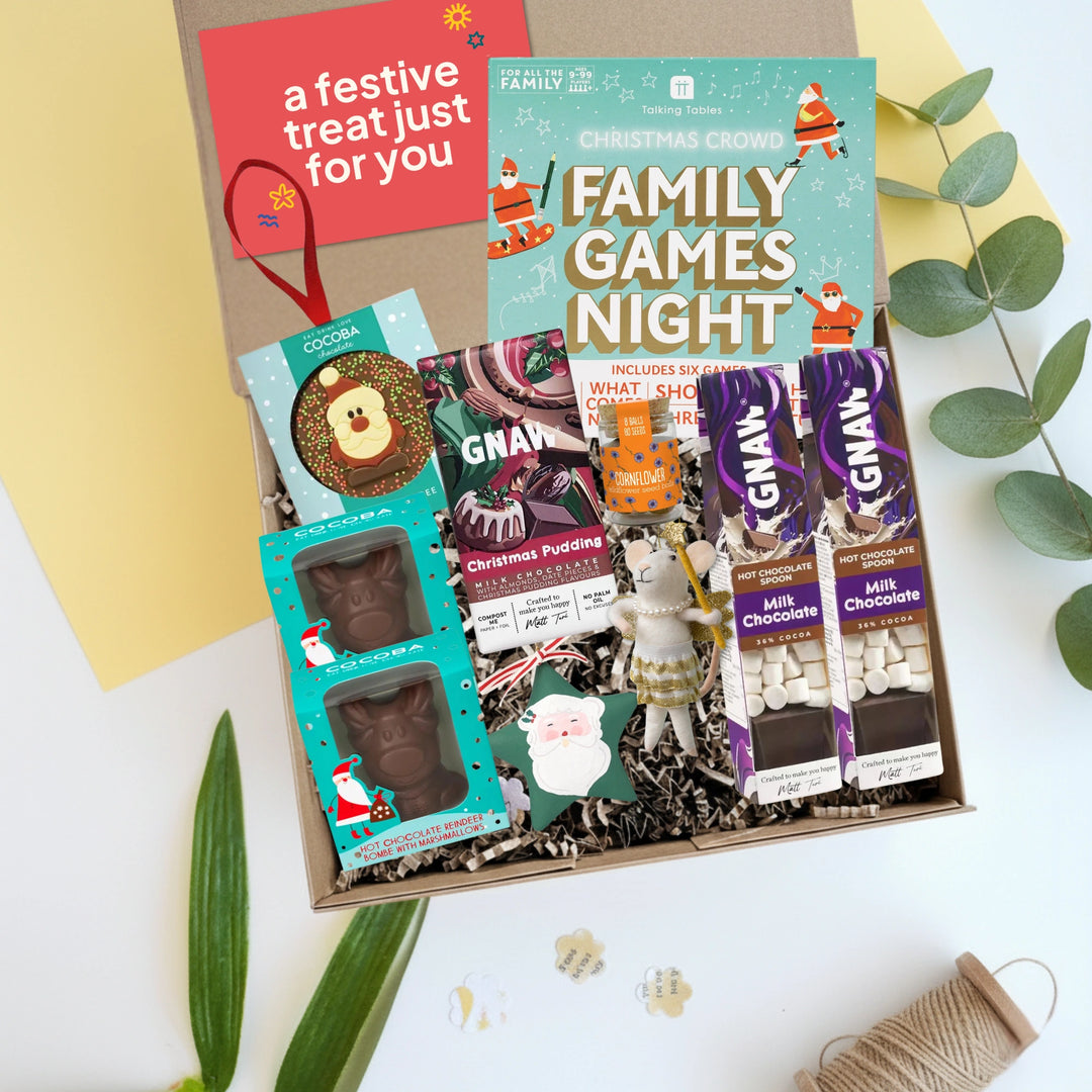 christmas gift hamper with assorted festive items for a family