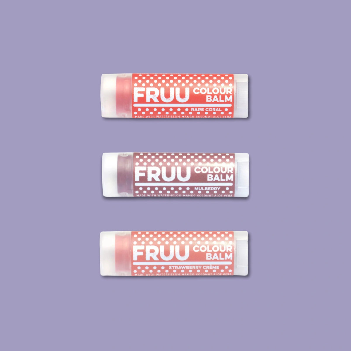 Three FRUU Colour Balm lip balms on a light purple background