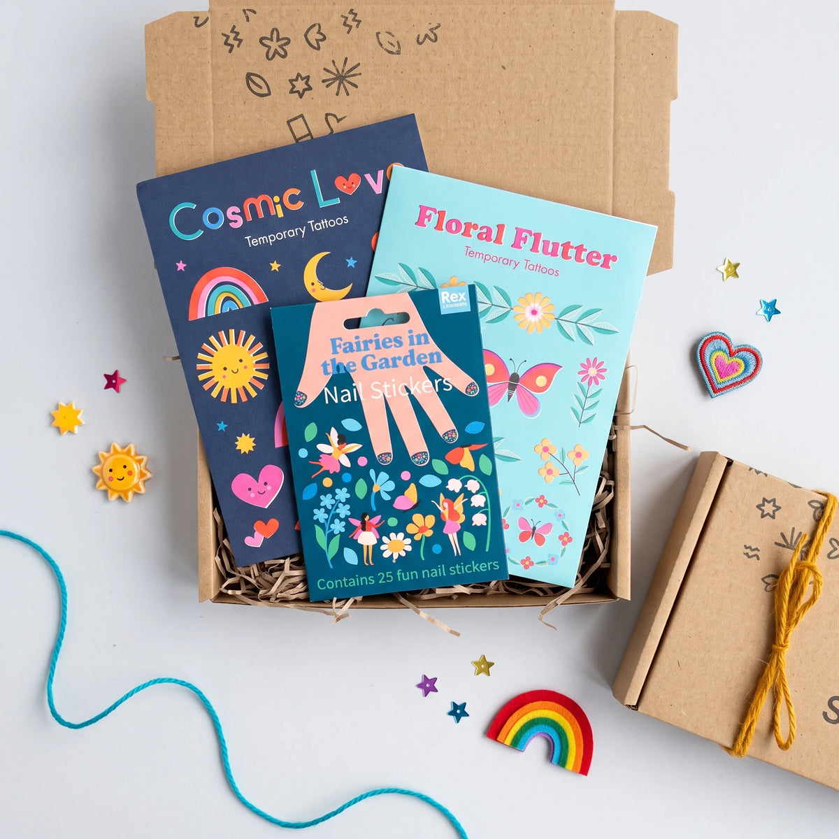 children's gift box with two packs of temporary tattoos and a set of fairy nail stickers