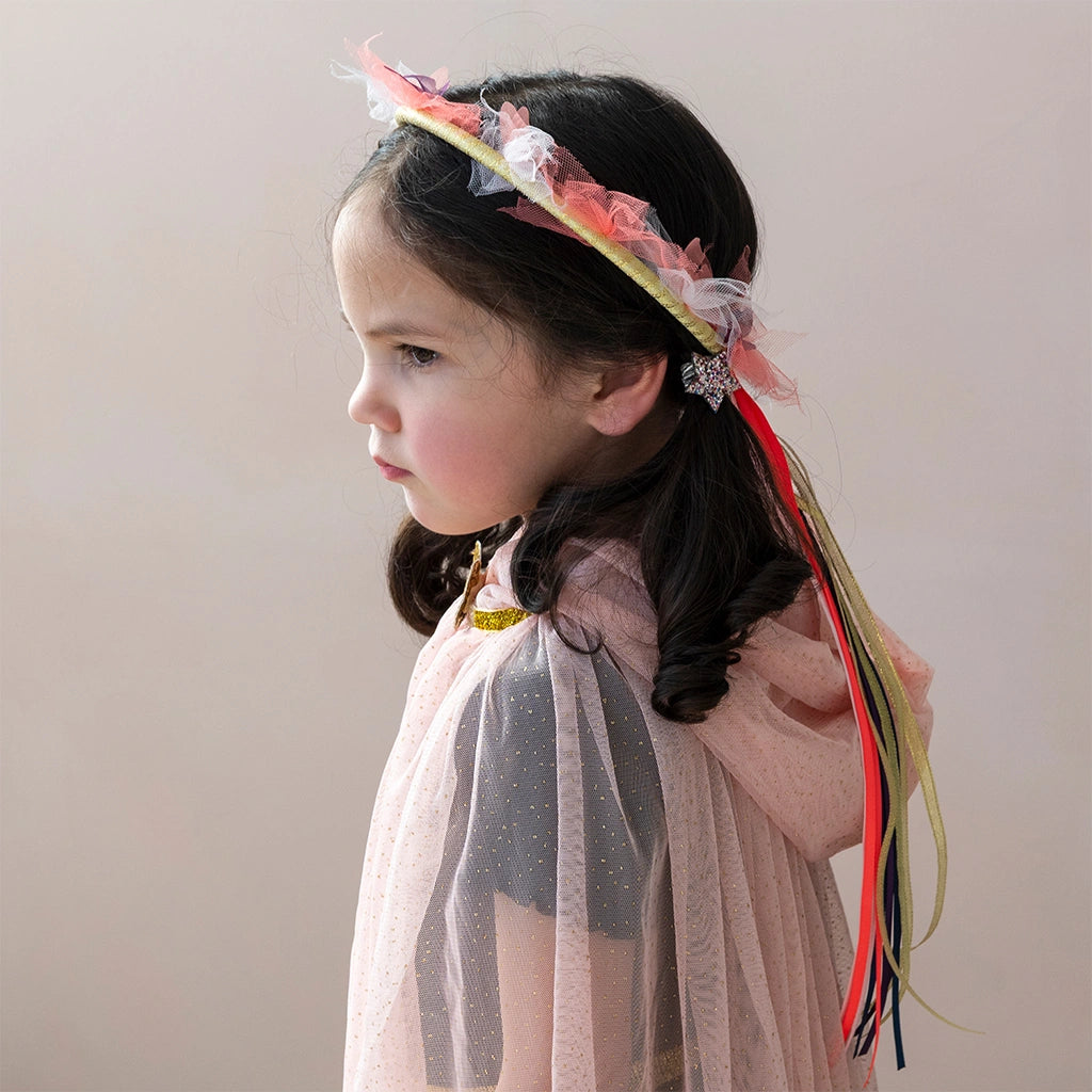 girl wearing a Rex London childrens fairy crown with pink and purple butterflies, petals and ribbons. For kids dress up and role play. 
