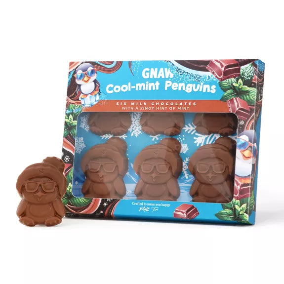 Chocolate penguins with blue and brown gift packaging on a white background