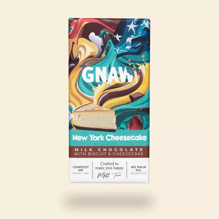 GNAW New York Cheesecake milk chocolate bar packaging on a beige background