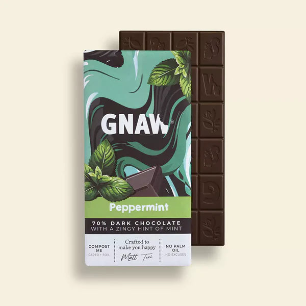 a dark peppermint chocolate bar by Gnaw chocolate with a green and black illustrated paper wrapper. perfect for gifting. 