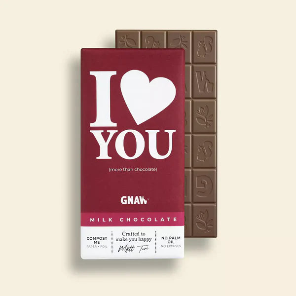 ethical milk chocolate bar by Gnaw in a dark red wrapper with white I Love You illustration. Perfect for valentines day or gifting to loved ones. 
