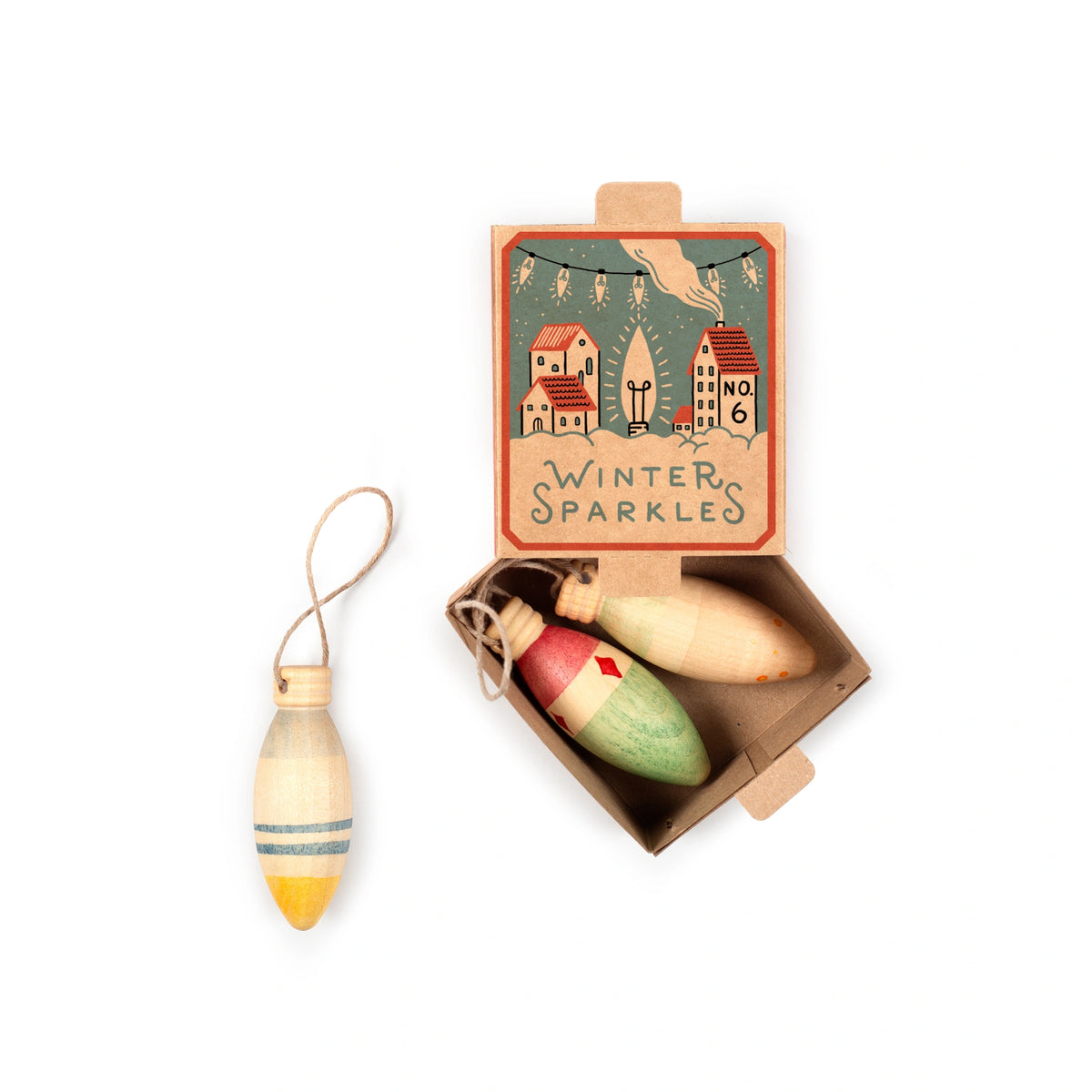 Wooden Christmas ornaments in a decorative box labeled 'Winter Sparkles' on a white background