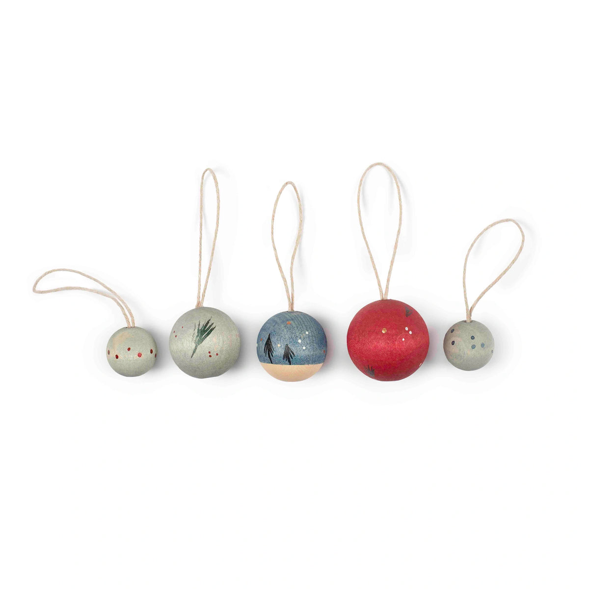 Set of five decorative hand painted ornaments with string on a white background