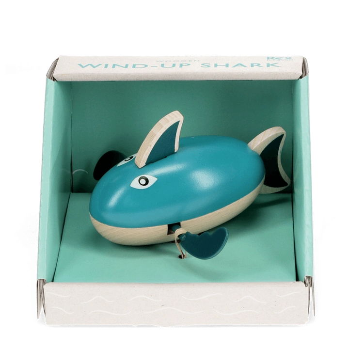 teal green wooden wind up shark bath toy in a turquoise gift box. For children aged 3 and over.