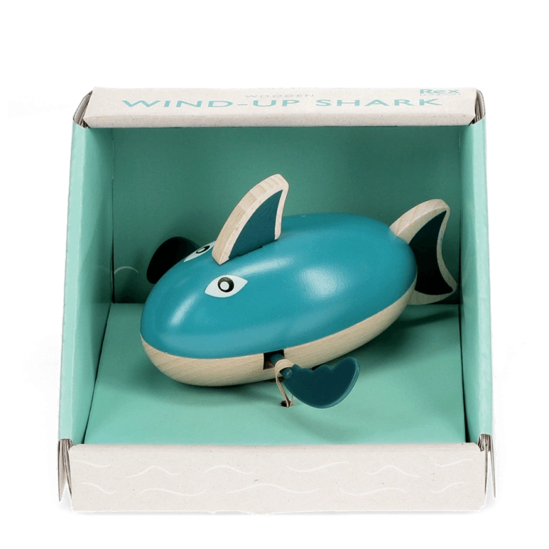 teal green wooden wind up shark bath toy in a turquoise gift box. For children aged 3 and over.