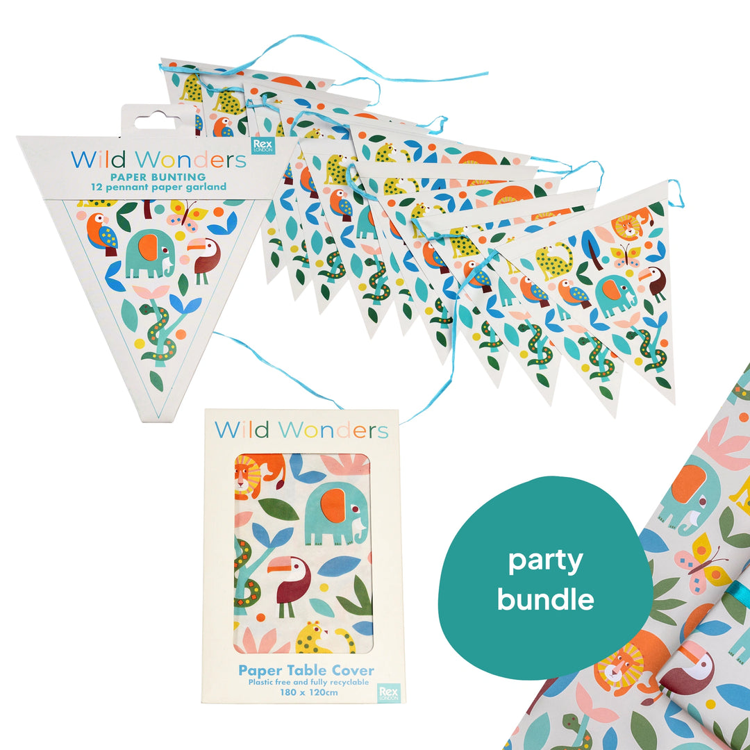 jungle animal party decor bundle including bunting, tablecloth and wrapping paper on a white background