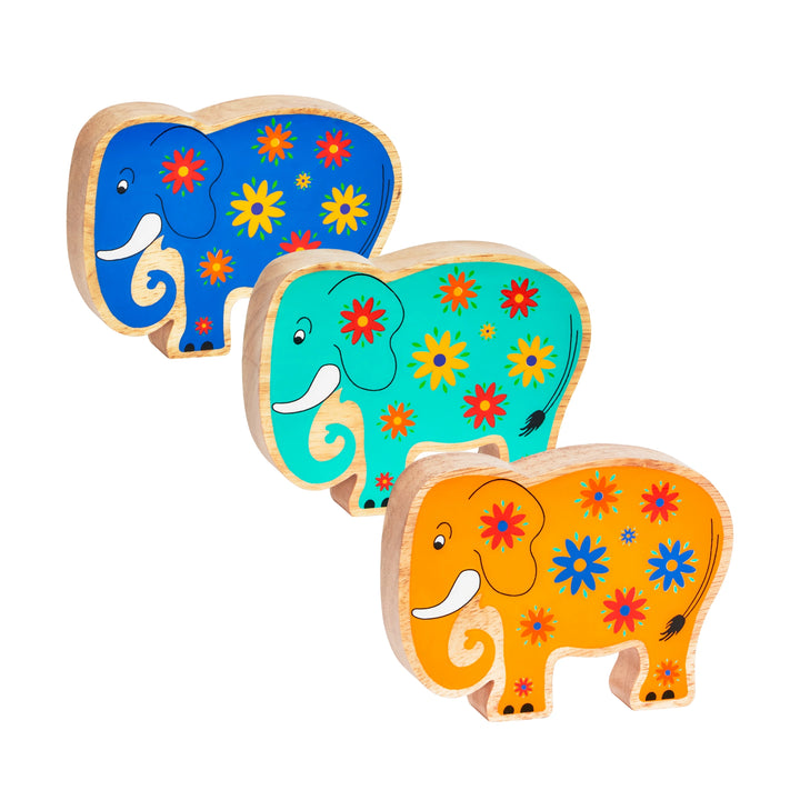 Three Lanka Kade 30th Birthday Wooden Elephant play figures in blue, green and orange. The elephants have colourful painted  flower details and are suitable from 10 months old.