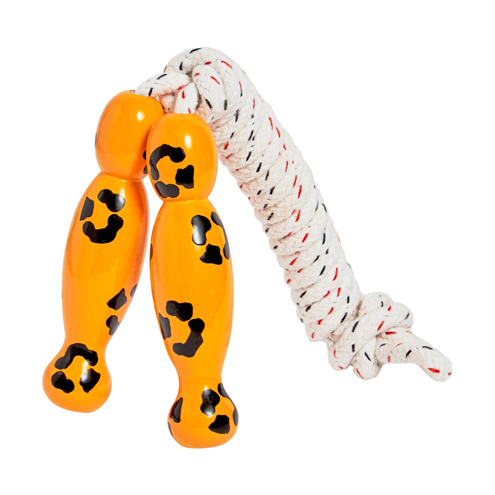 Yellow skipping rope with black leopard print handles on a white background