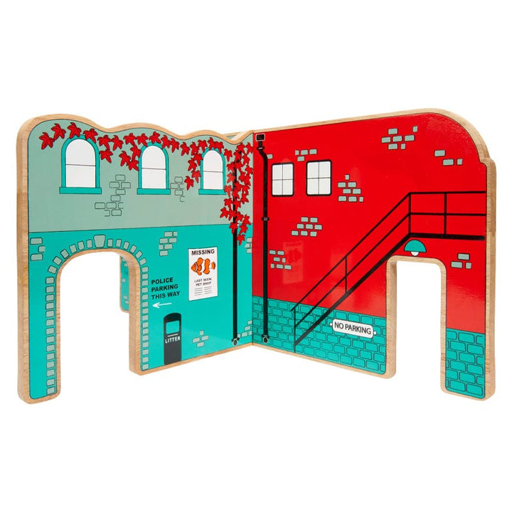 Inside view of wooden play scene with police and fire station. age 3+