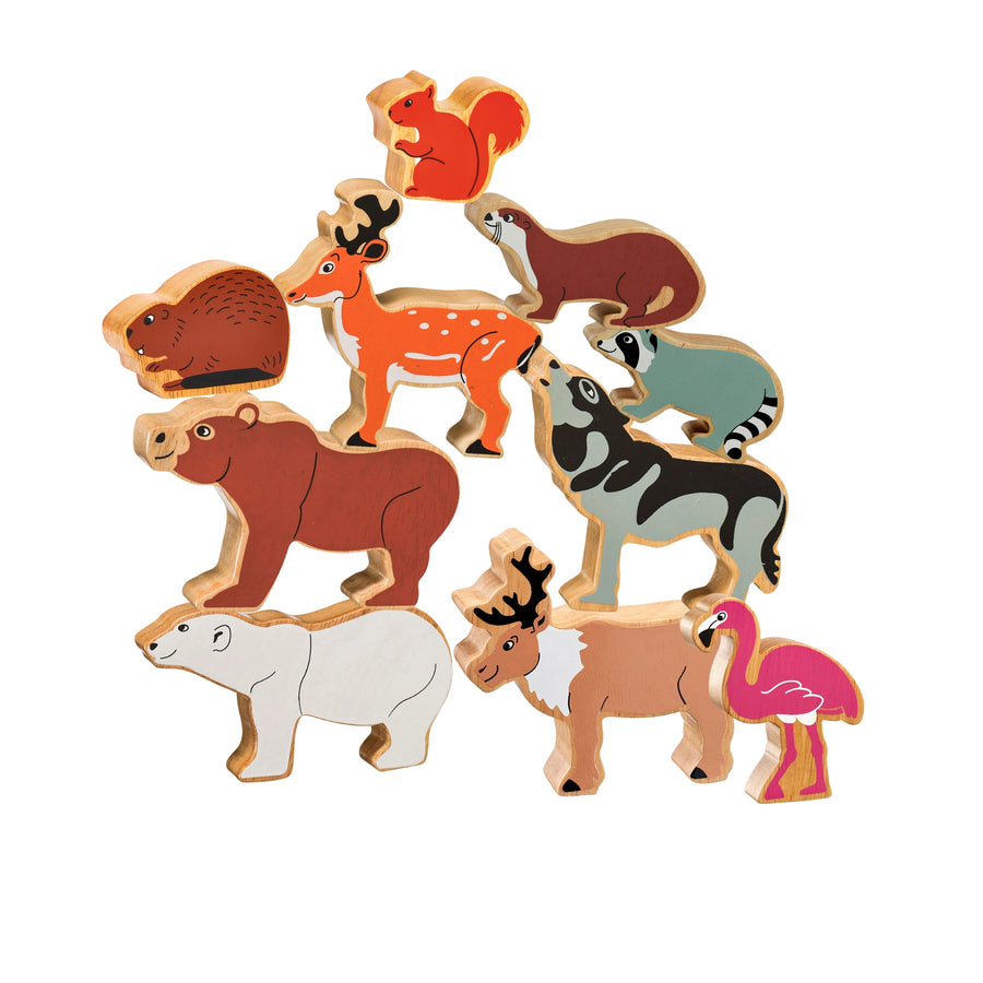 Set of colourful north American animal figurines on a white background