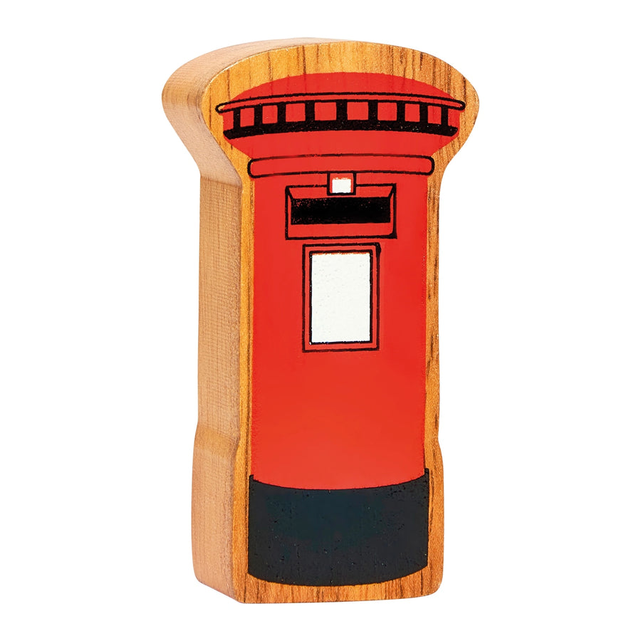 Wooden toy British post box on a white background