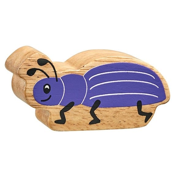 A wooden toy figure resembling a purple beetle with black antennae and white details on its body, smiling.