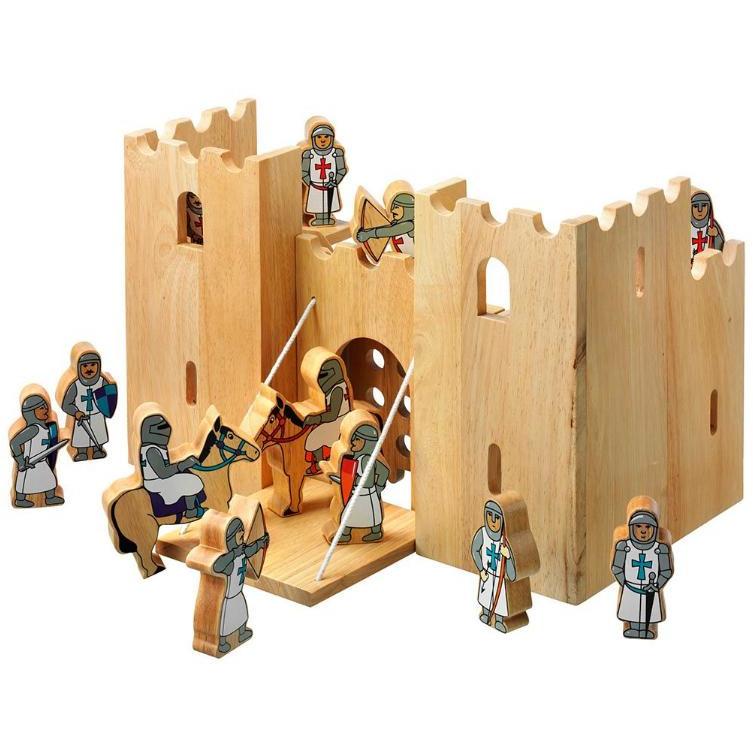 A wooden castle playset with multiple colourful knight figures in red and blue, standing in front of the castle walls.