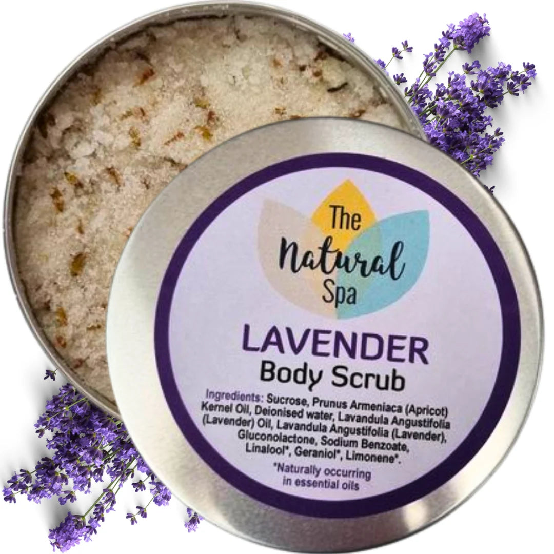 Lavender body scrub in a metal tin with lavender flowers around it, featuring &