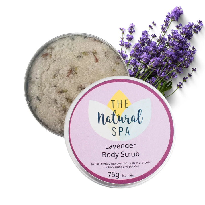 Lavender body scrub in a tin with a label and lavender flowers on a white background