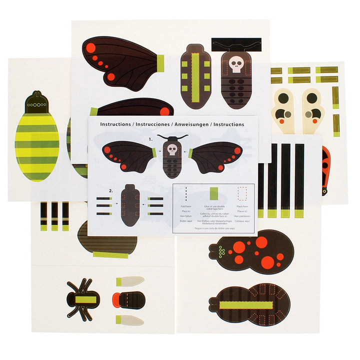 Children's craft kit with insect shapes and instructions on a white background