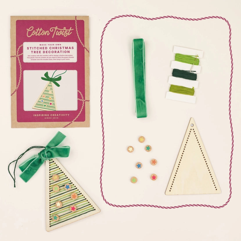 Cotton Twist stitching kit for Christmas tree decoration with materials on a white background