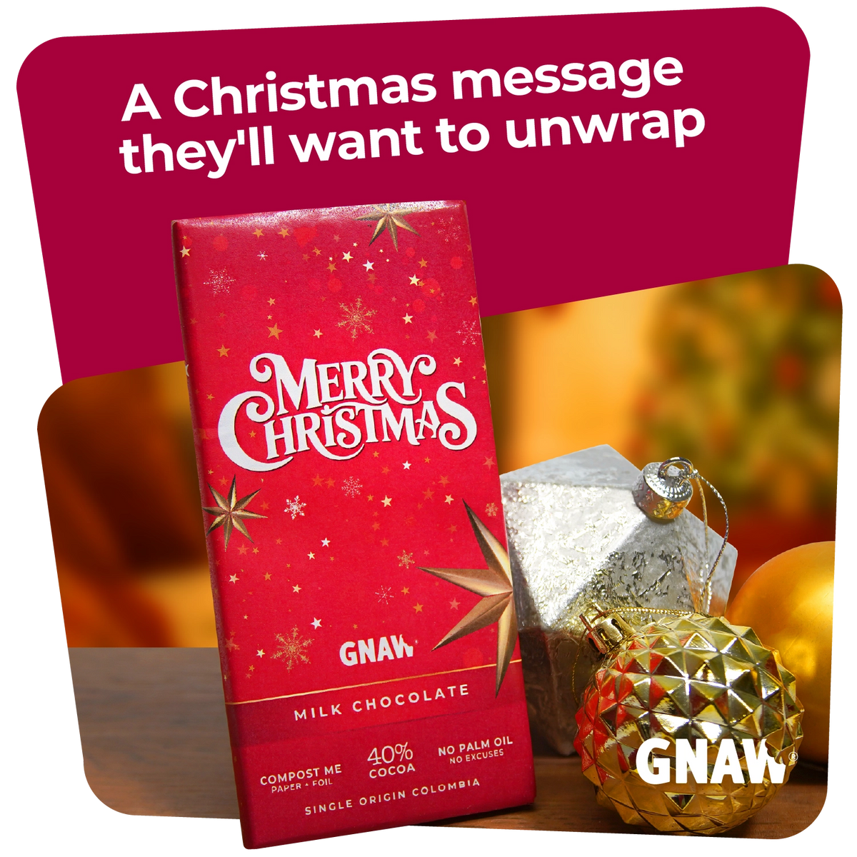 A red GNAW Christmas milk chocolate bar package with white 'Merry Christmas' lettering, shown with festive gold and silver ornaments and a warm holiday background. Large text at the top reads, 'A Christmas message they'll want to unwrap.